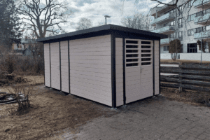 Closed bin storage with a shed